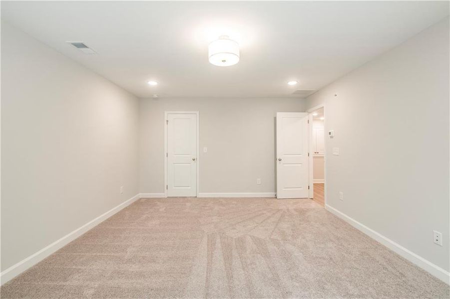 Spacious, unfurnished interior of a new home in River Walk Place, Lawrenceville (Image 37).