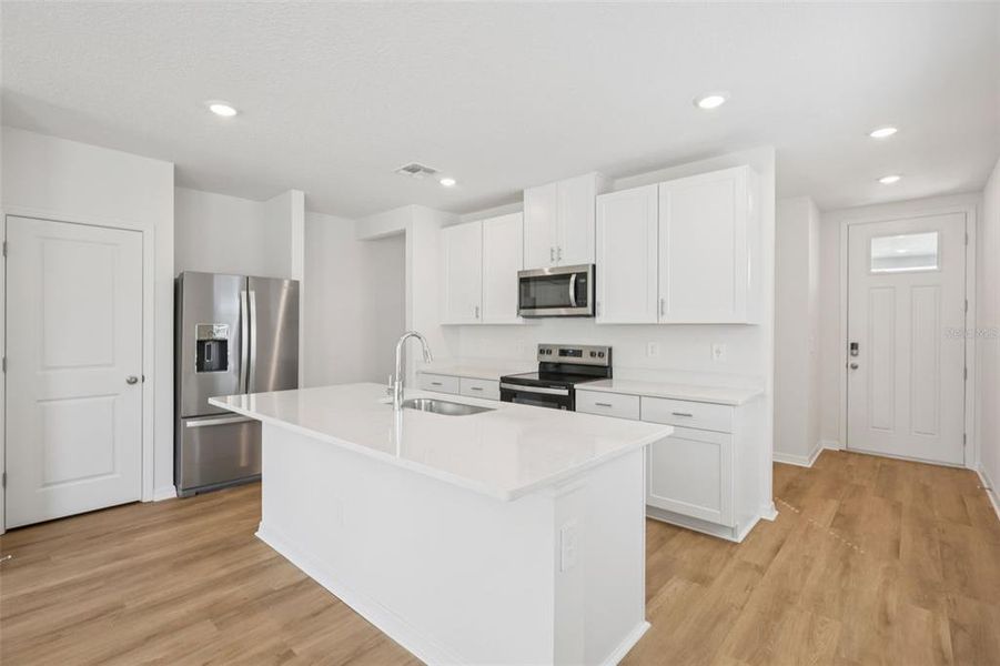 Furnished interior view inside a new home in Benton Hills - Premier Series, Brooksville (Image 3). Furnished interior view inside a new home in Benton Hills - Premier Series, Brooksville (Image 3).