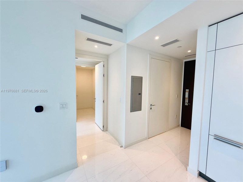 Spacious, unfurnished interior of a new home in Aston Martin Residences, Miami (Image 6).