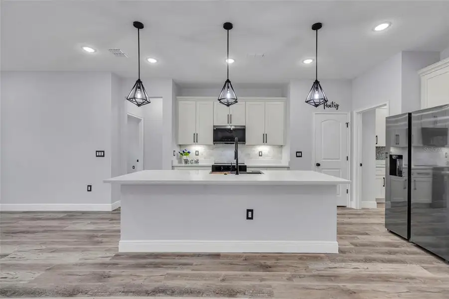 Furnished interior view inside a new home in , Kissimmee (Image 9).