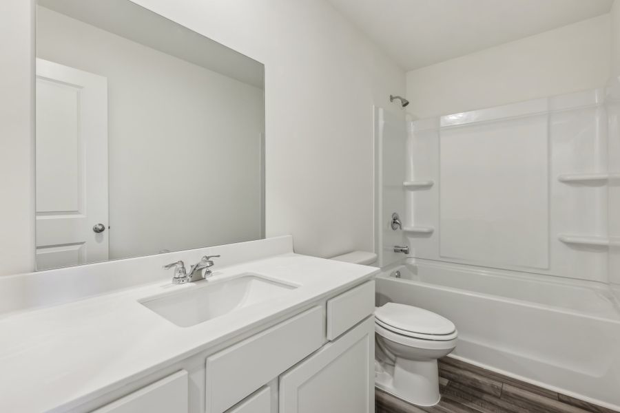 Representative furnished interior of a home built from the Neptune by Starlight Homes in Castlewood South, Taylor (Image 16). Representative furnished interior of a home built from the Neptune by Starlight Homes in Castlewood South, Taylor (Image 16).
