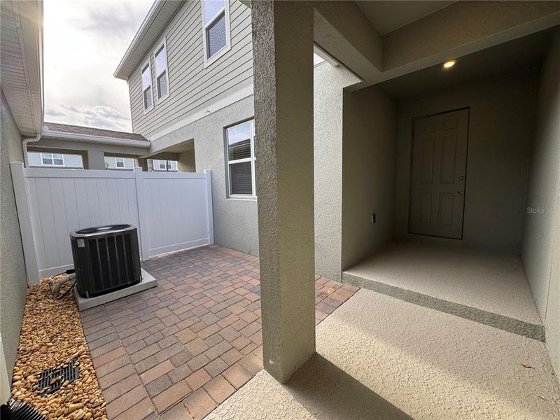 Exterior details and patio area of a home in Hamlin Ridge, Winter Garden (Image 3).