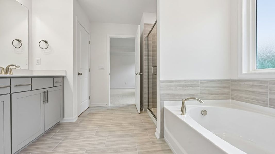 Furnished interior view inside a new home in The Estates Park, Apex (Image 14).