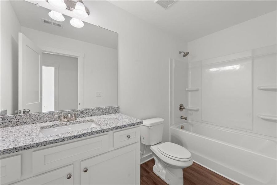 Furnished interior view inside a new home in Ellington Farms, Statham (Image 12).