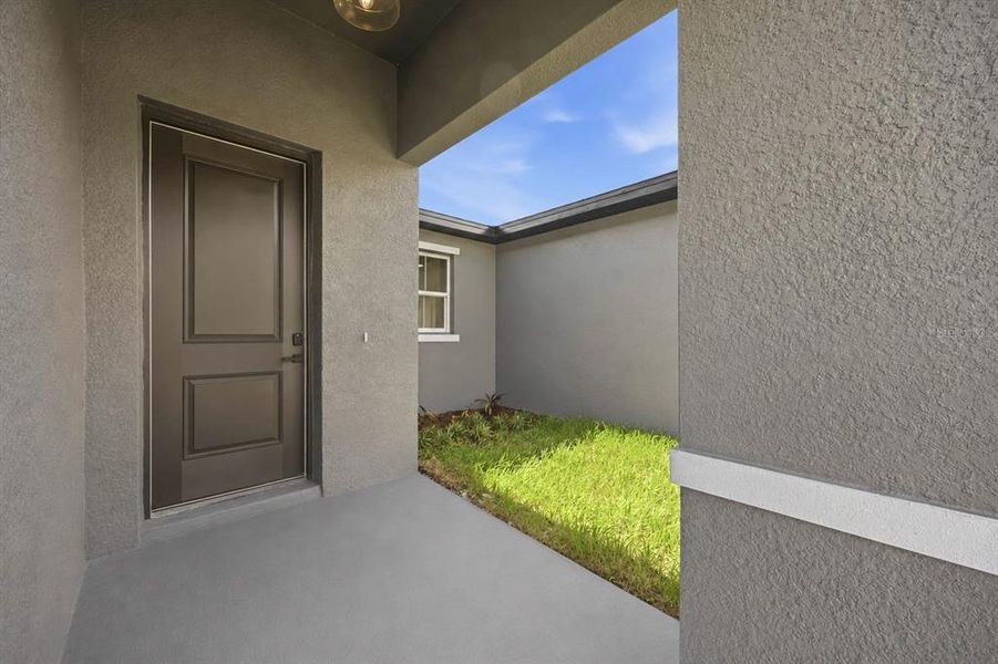 Exterior details and patio area of a home in , Winter Haven (Image 4). Exterior details and patio area of a home in , Winter Haven (Image 4).