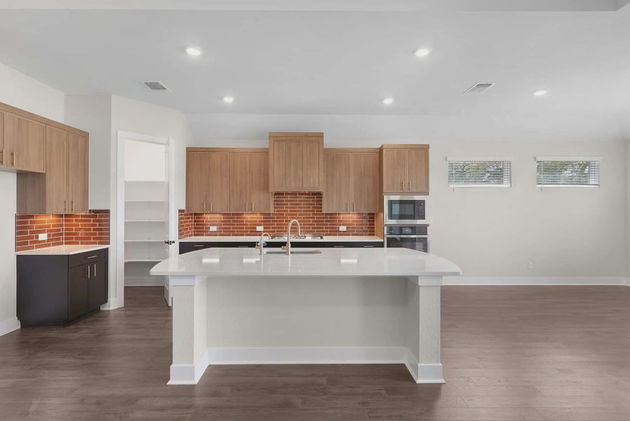 Representative furnished interior of a home built from the Brooks by Chesmar Homes in University Heights, McKinney (Image 6).
