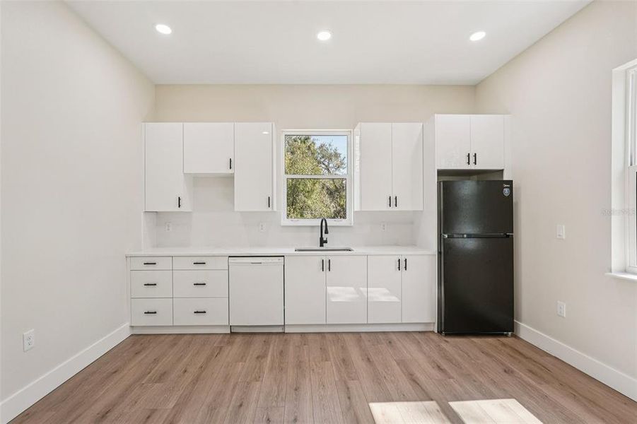 Furnished interior view inside a new home in , Port Charlotte (Image 11).
