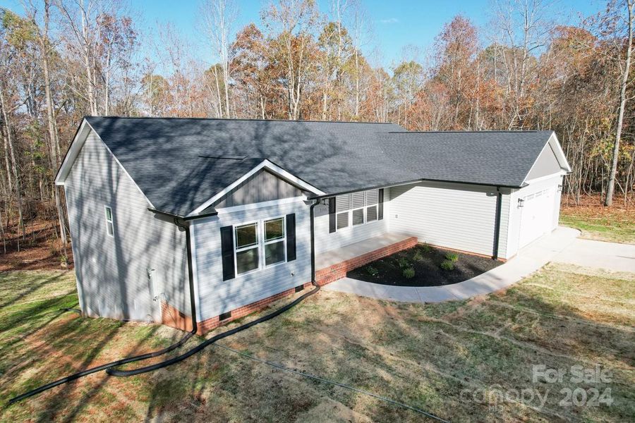 Extended sidewalk and covered front porch