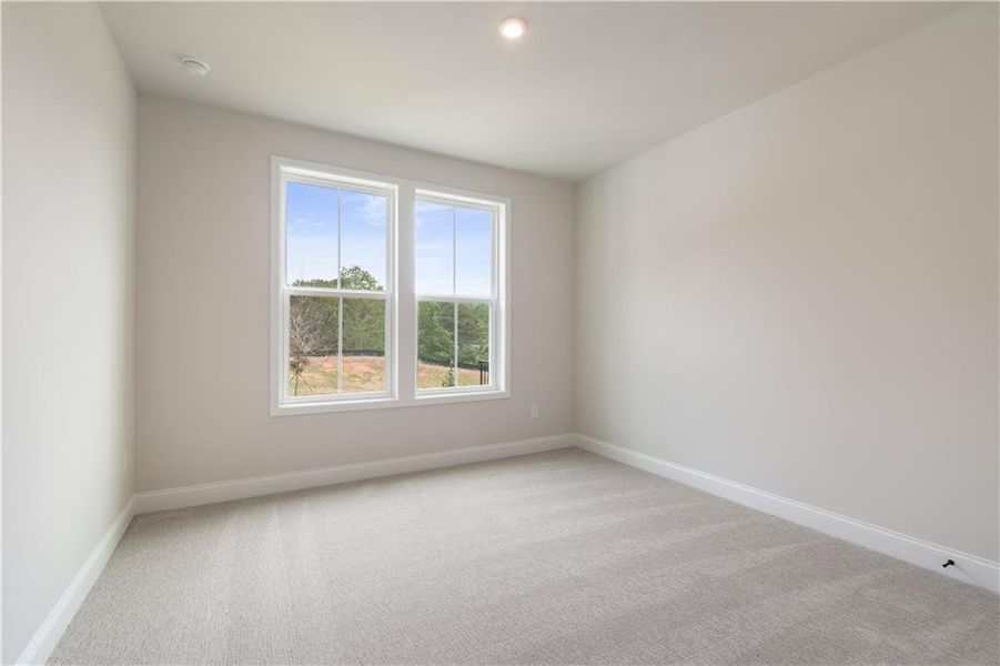 Spacious, unfurnished interior of a new home in Tiberon Woods, Cumming (Image 24).