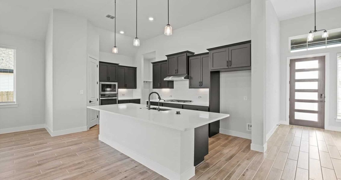 Furnished interior view inside a new home in Village at Three Oaks, Seguin (Image 6). Furnished interior view inside a new home in Village at Three Oaks, Seguin (Image 6).