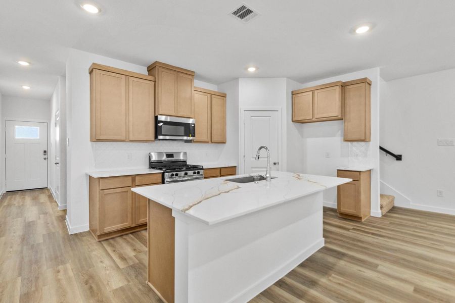 Furnished interior view inside a new home in Grand West, Houston (Image 10).