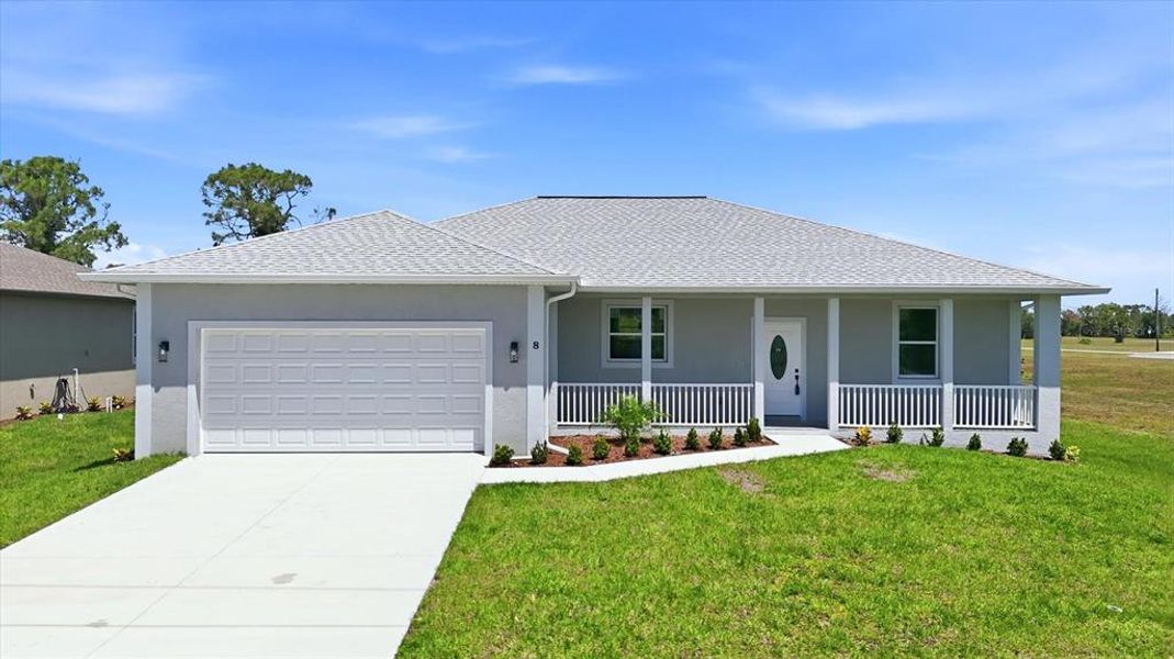 Front exterior of a new home in , Placida, FL, highlighting curb appeal (Image 18).