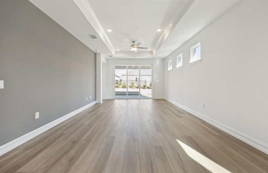 Spacious living area with accent wall