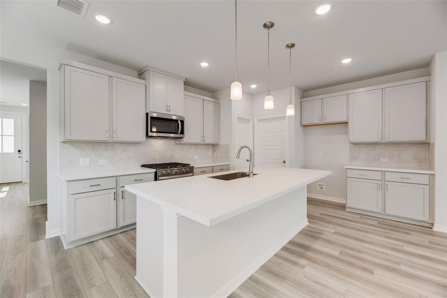 Furnished interior view inside a new home in Spiritas Ranch, Little Elm (Image 5). Furnished interior view inside a new home in Spiritas Ranch, Little Elm (Image 5).