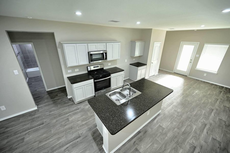Furnished interior view inside a new home in Breckenridge Forest, Spring (Image 3).