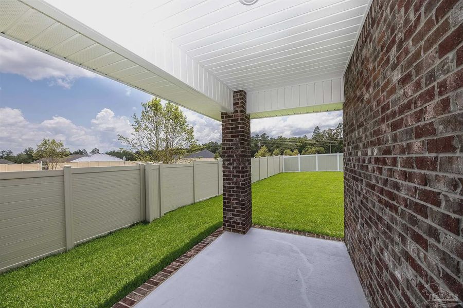 Exterior details and patio area of a home in Parkland Place, Pace (Image 4).