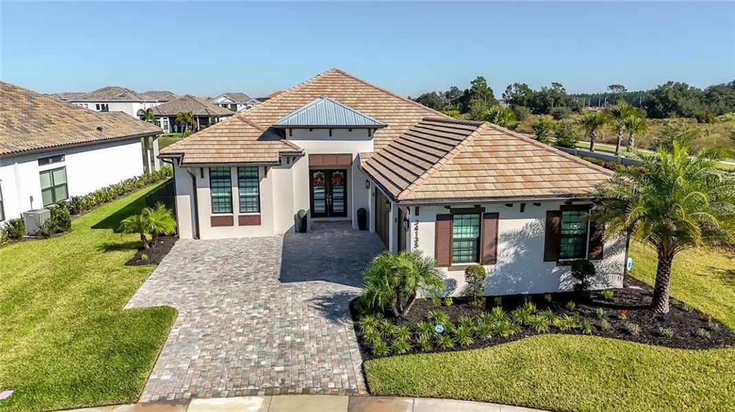 Front exterior of a new home in , Wesley Chapel, FL, highlighting curb appeal (Image 21).