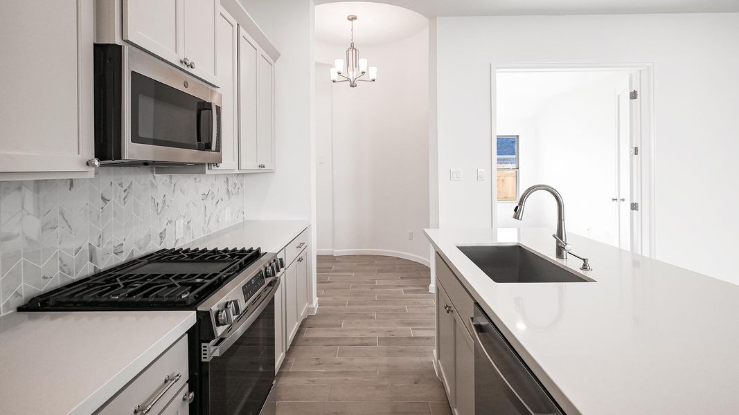 Furnished interior view inside a new home in Crosswinds 40', Kyle (Image 11).