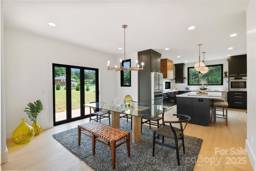 Dining Room with fully opening, sliding bi-fold door to deck Dining Room with fully opening, sliding bi-fold door to deck