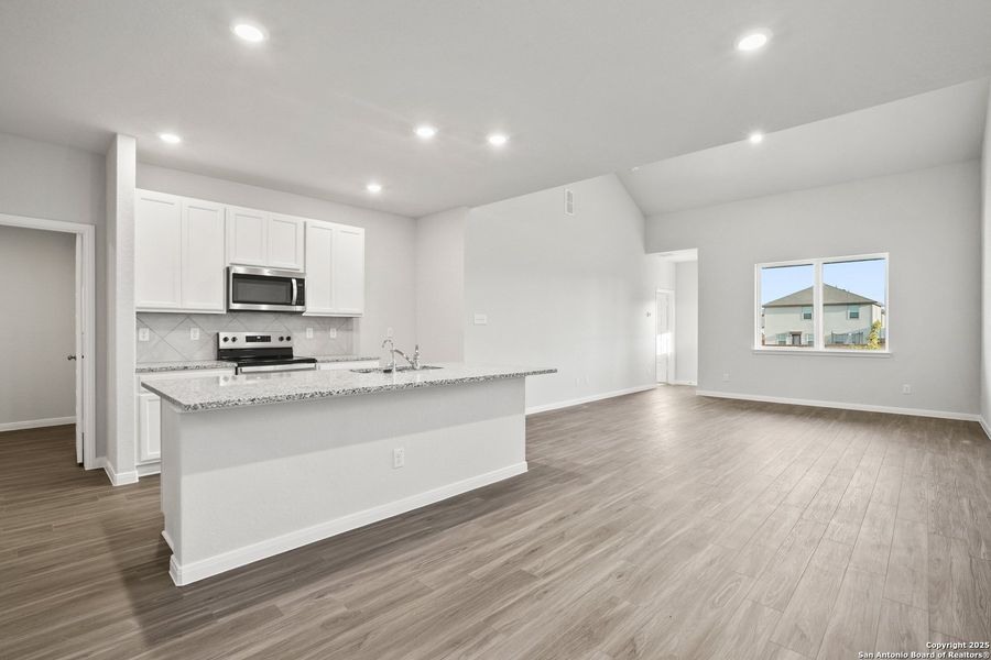 Furnished interior view inside a new home in Abbott Place, St. Hedwig (Image 9).