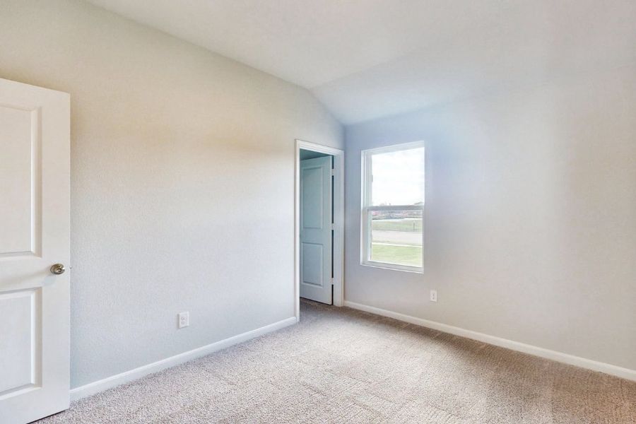 A room with a door and a window. A room with a door and a window.