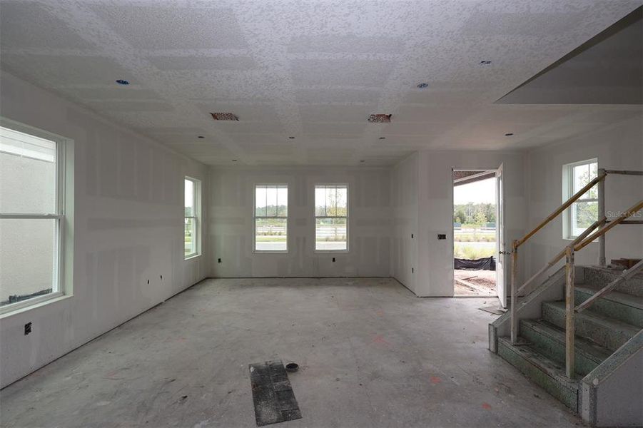 In-progress construction of a new home in Center Lake on the Park, St. Cloud, FL (Image 15).