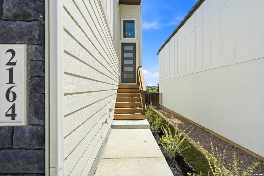 Exterior details and patio area of a home in Prominence Urban, San Antonio (Image 4). Exterior details and patio area of a home in Prominence Urban, San Antonio (Image 4).