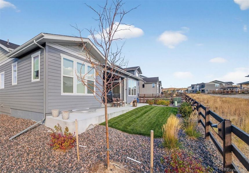 Exterior details and patio area of a home in Montaine, Castle Rock (Image 1).