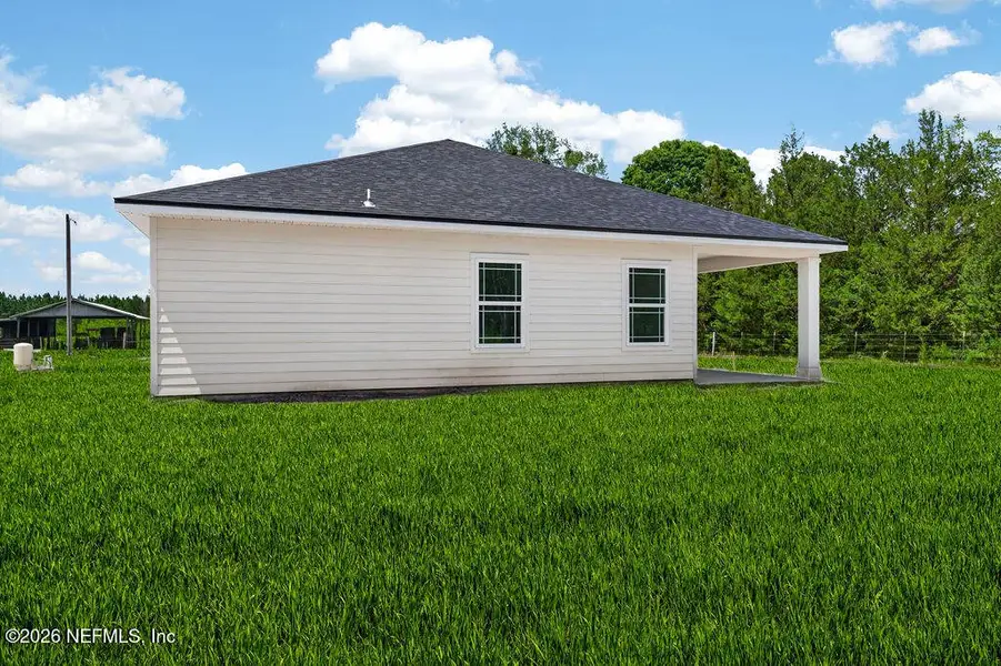 Exterior details and patio area of a home in , Starke (Image 19).
