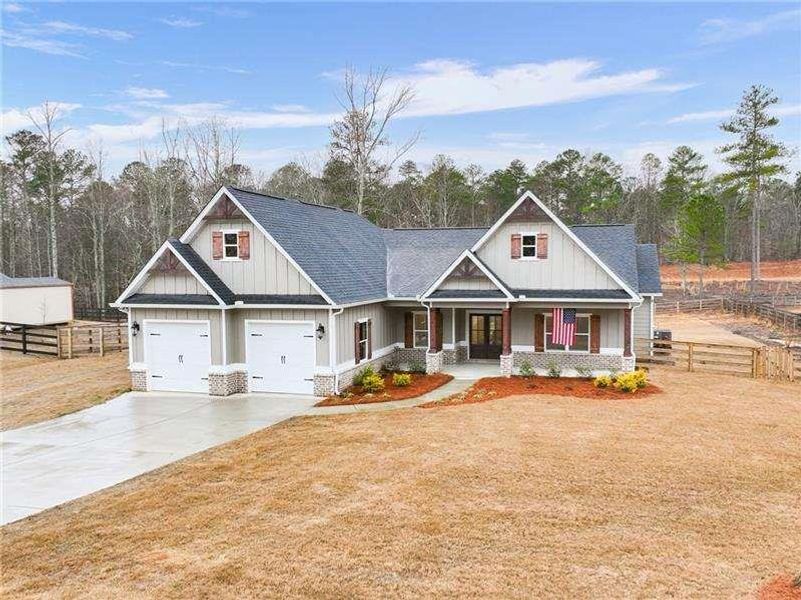 Front exterior of a new home in , Dallas, GA, highlighting curb appeal (Image 27).
