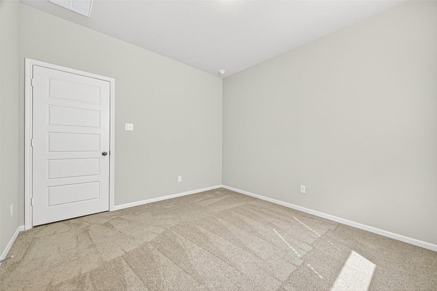 Spacious, unfurnished interior of a new home in Sunterra, Katy (Image 42).