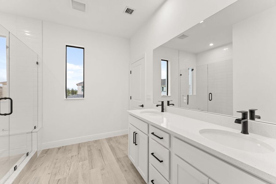 Furnished interior view inside a new home in Newfield - Rosette Park, Palm City (Image 6).