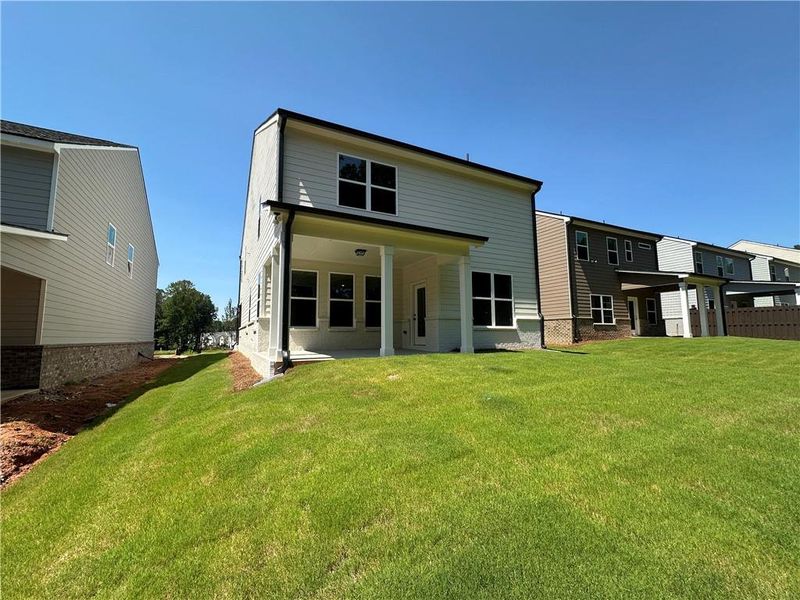 Exterior details and patio area of a home in Kentmere, Auburn (Image 27).