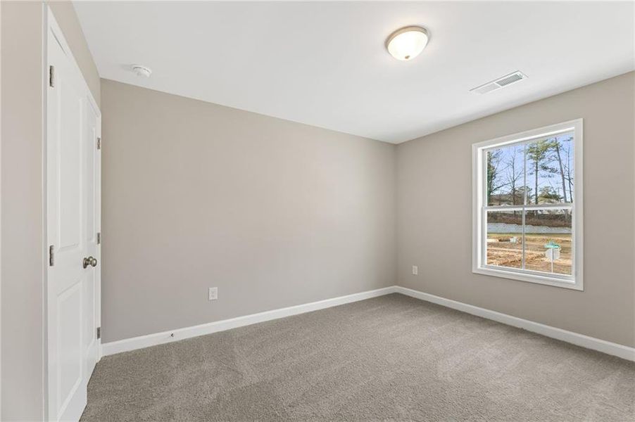 Spacious, unfurnished interior of a new home in River Walk Place, Lawrenceville (Image 19).