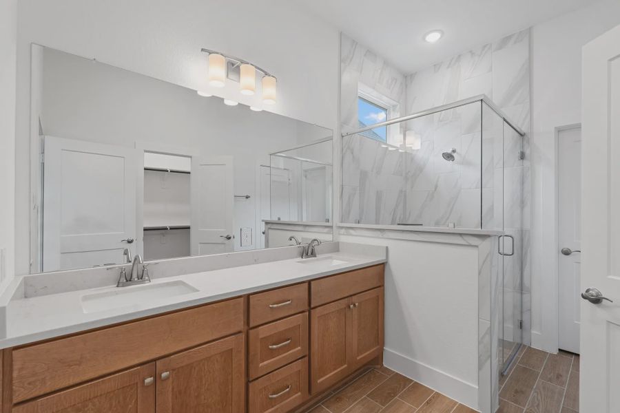 Representative furnished interior of a home built from the Torrey Pines by Chesmar Homes in Riceland Alley Loads, Mont Belvieu (Image 9).