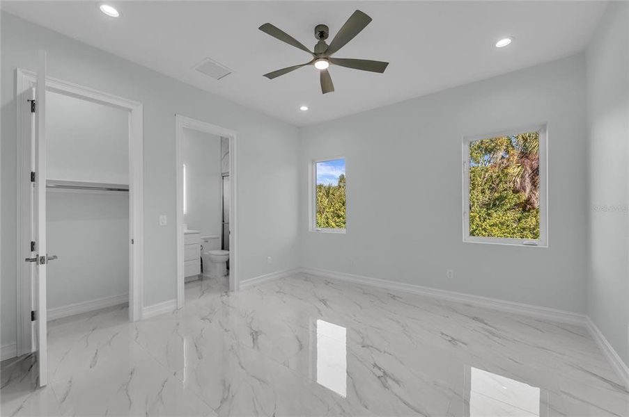 Spacious, unfurnished interior of a new home in , Port Charlotte (Image 43).