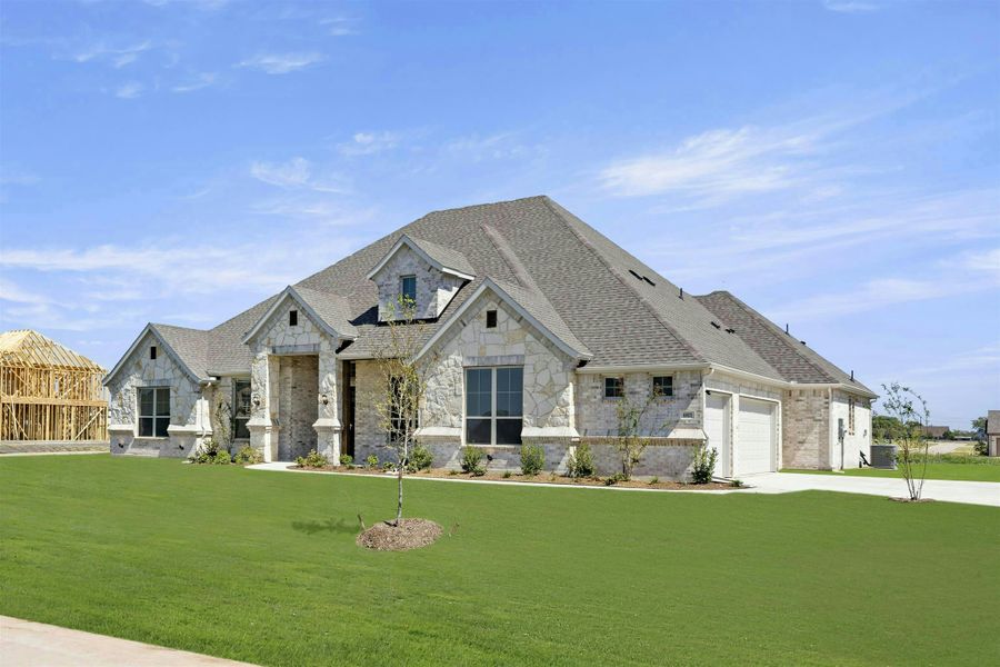 Representative exterior photo of a completed home built from the Brady by Kindred Homes in Oak Creek Ranch, Waxahachie, TX (Image 25).