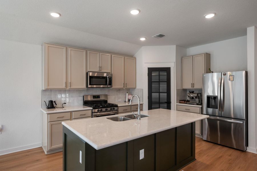 Furnished interior view inside a new home in Sun Chase, Del Valle (Image 9). Furnished interior view inside a new home in Sun Chase, Del Valle (Image 9).