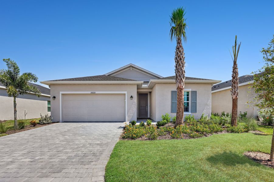 Front exterior of a new home in Lennar at Turnleaf, Punta Gorda, FL, highlighting curb appeal (Image 1). Front exterior of a new home in Lennar at Turnleaf, Punta Gorda, FL, highlighting curb appeal (Image 1).
