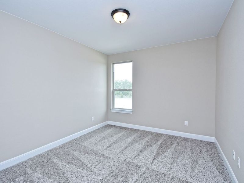 Representative unfurnished interior of a home built from the Madera II by Giddens Homes in Scofield Farms Estates, Georgetown (Image 359).