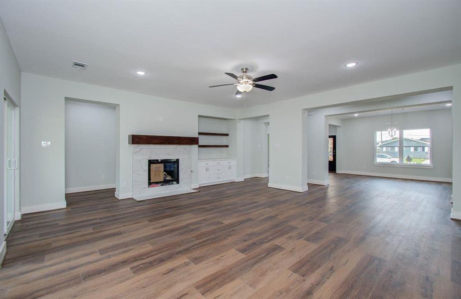 This inviting living area features a cozy fireplace