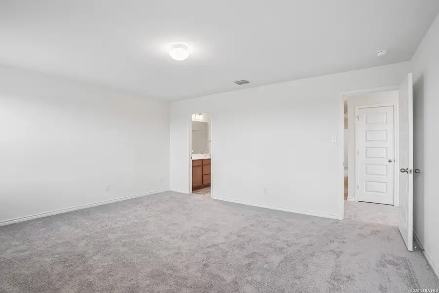 Spacious, unfurnished interior of a new home in Medina Crossing, Von Ormy (Image 32).