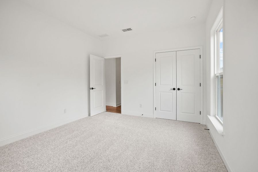 Spacious, unfurnished interior of a new home in Forest Creek, Waxhaw (Image 78).