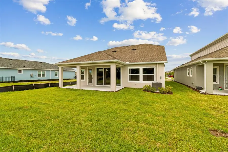 Exterior details and patio area of a home in Waterset Classic Series, Apollo Beach (Image 19).