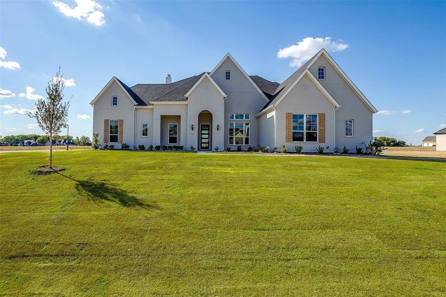 View of front of home with a front yard