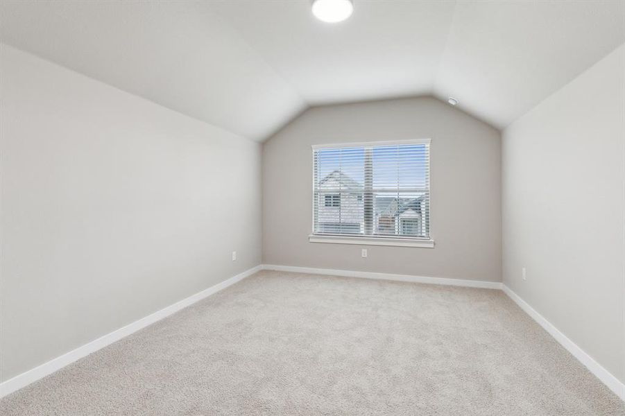 Game room in the Elm home plan by Trophy Signature Homes – REPRESENTATIVE PHOTO