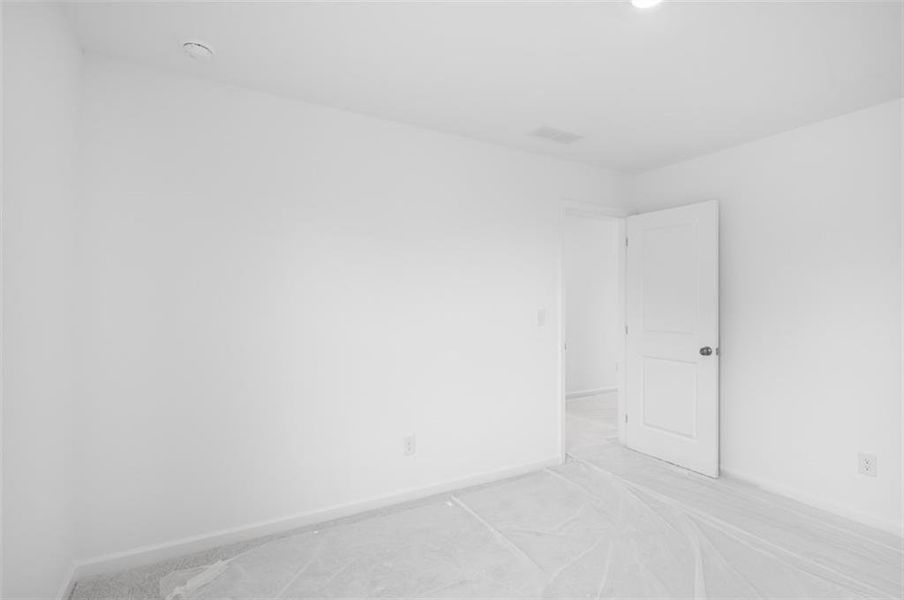 Spacious, unfurnished interior of a new home in Windance Lake, Loganville (Image 24).