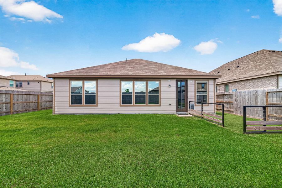 Exterior details and patio area of a home in , Houston (Image 3). Exterior details and patio area of a home in , Houston (Image 3).