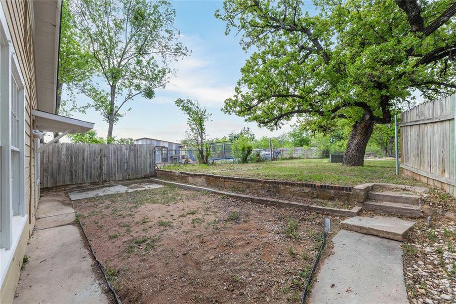 Exterior details and patio area of a home in , Brownwood (Image 20).