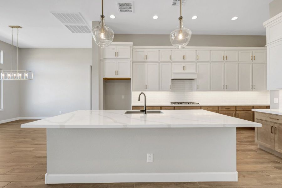 Furnished interior view inside a new home in Sentiero at Windrose, Waddell (Image 5).